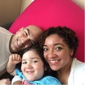 Adana Protonentis with her partner and child.