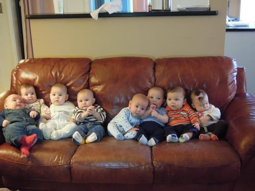 The group’s “PEPS babies” lined up on a couch during their Newborn Group in 2012. Image courtesy of Eebie Motlong.&nbsp;