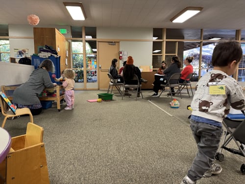 Parent education and connection at toddler class. Photo courtesy of VISIBLE.