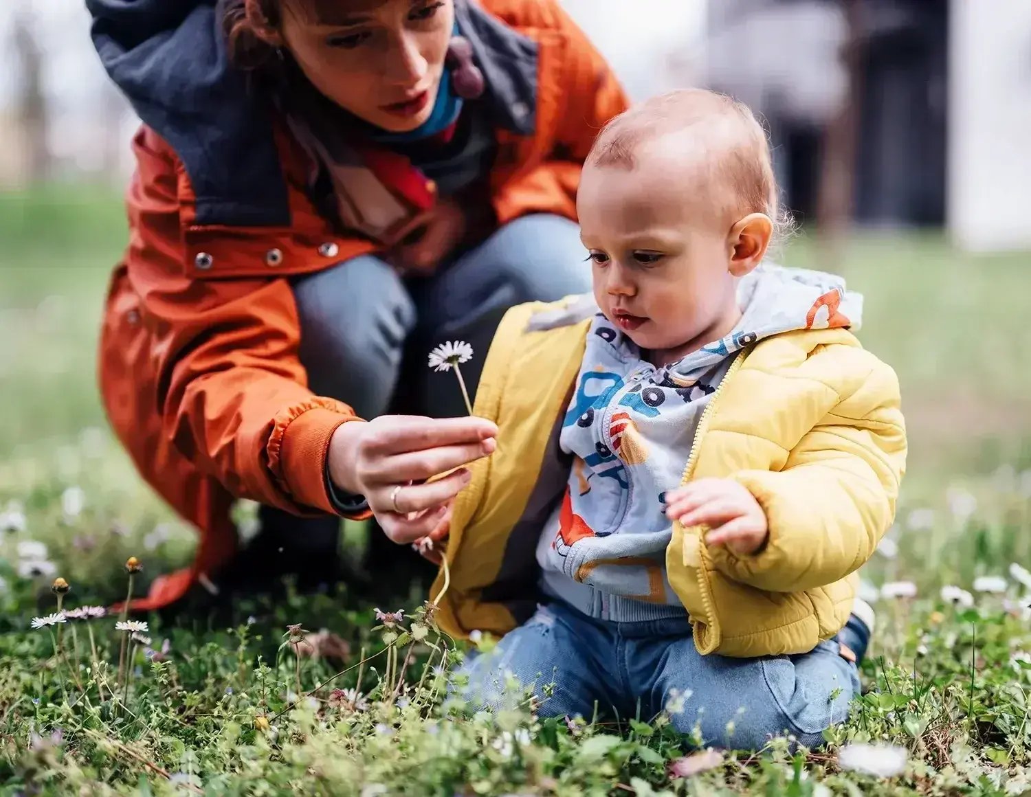 A young parent and their infant child at a PEPS event.